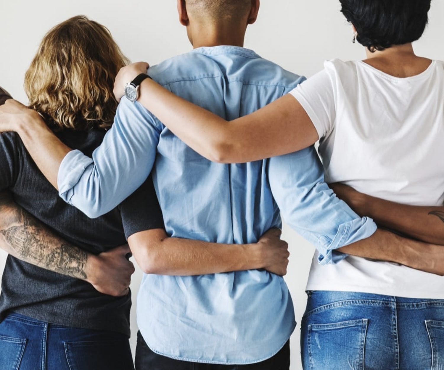 Diverse group of people facing away