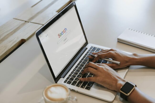 Searching the internet on a laptop